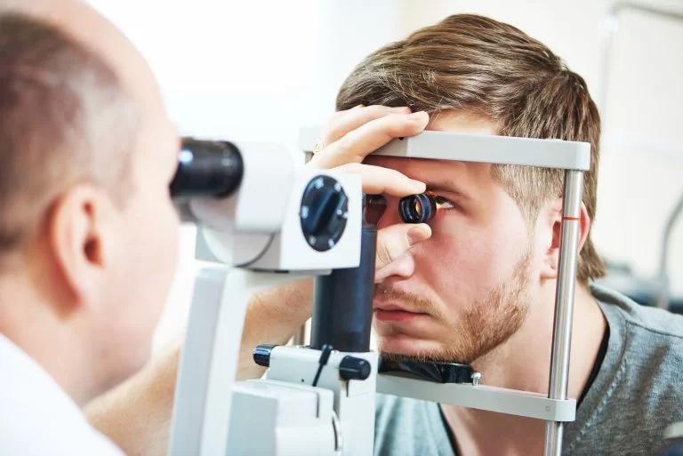 Optometrist performing an eye exam